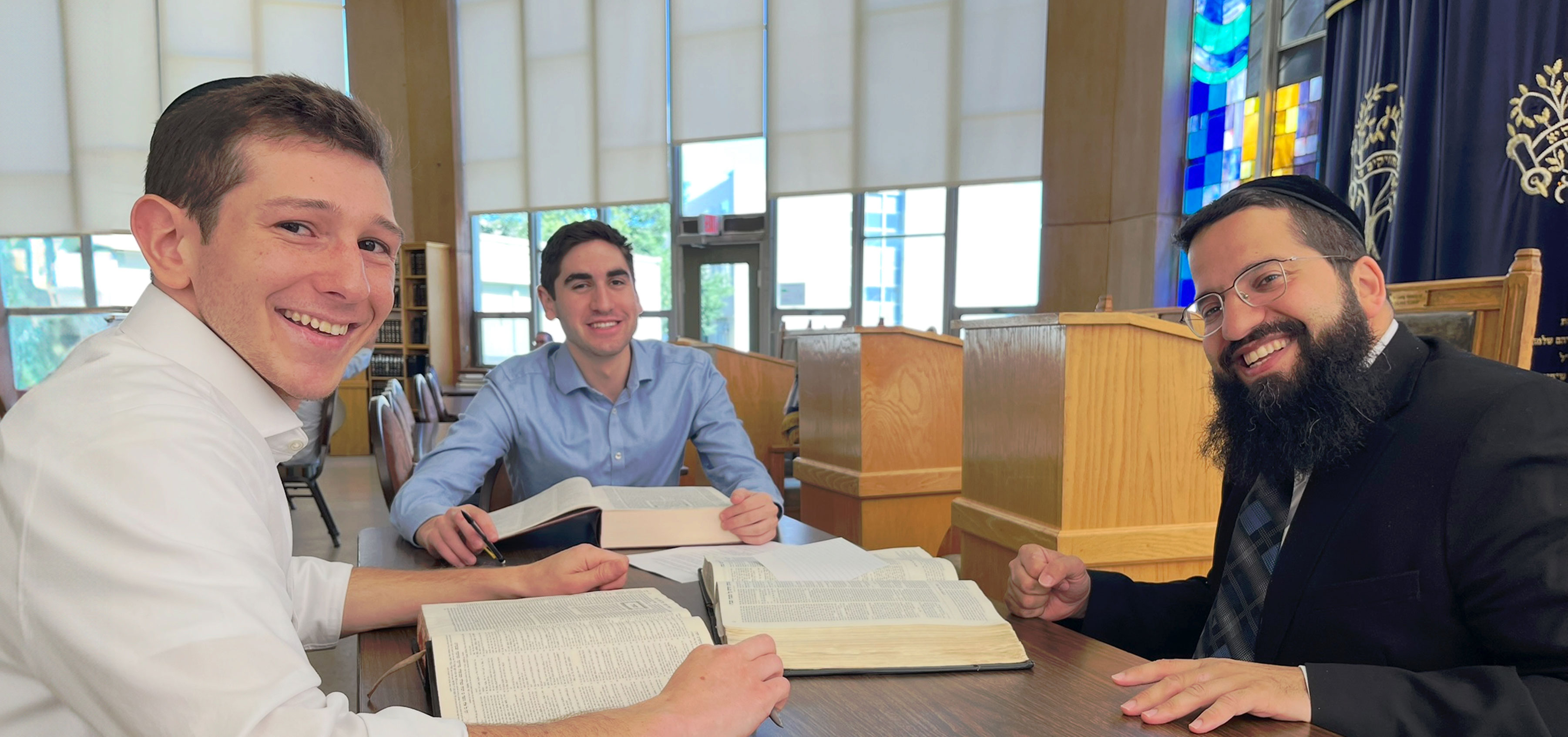 men studying torah