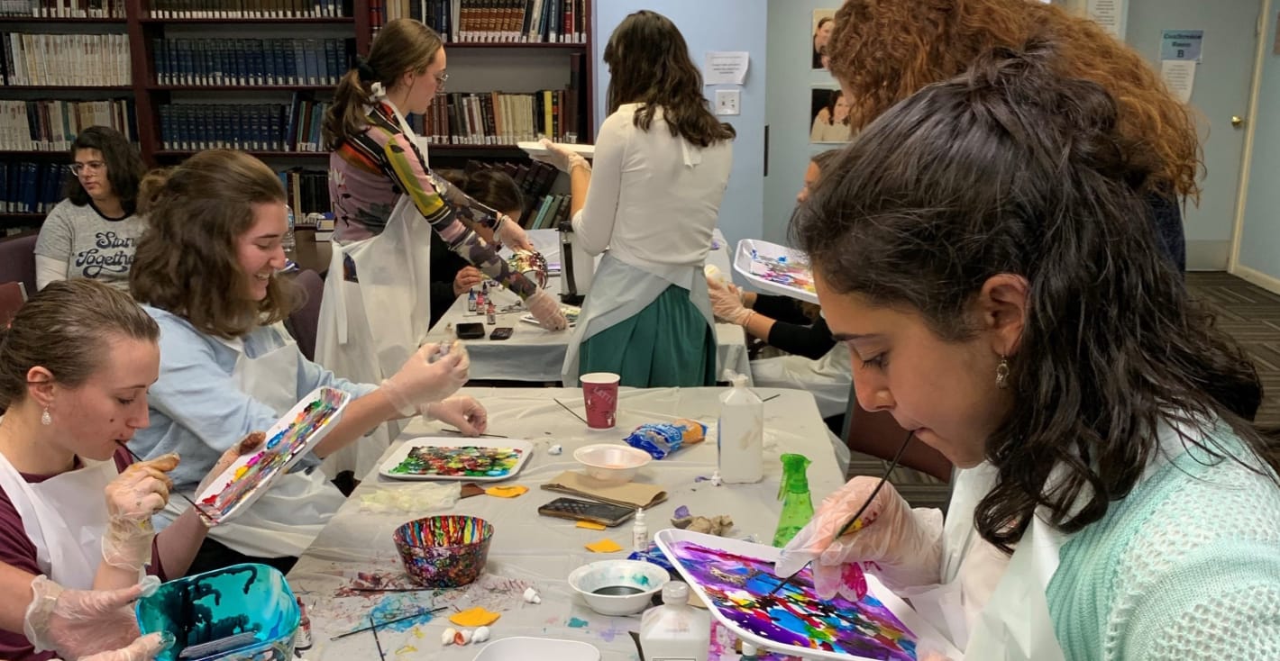 female students painting